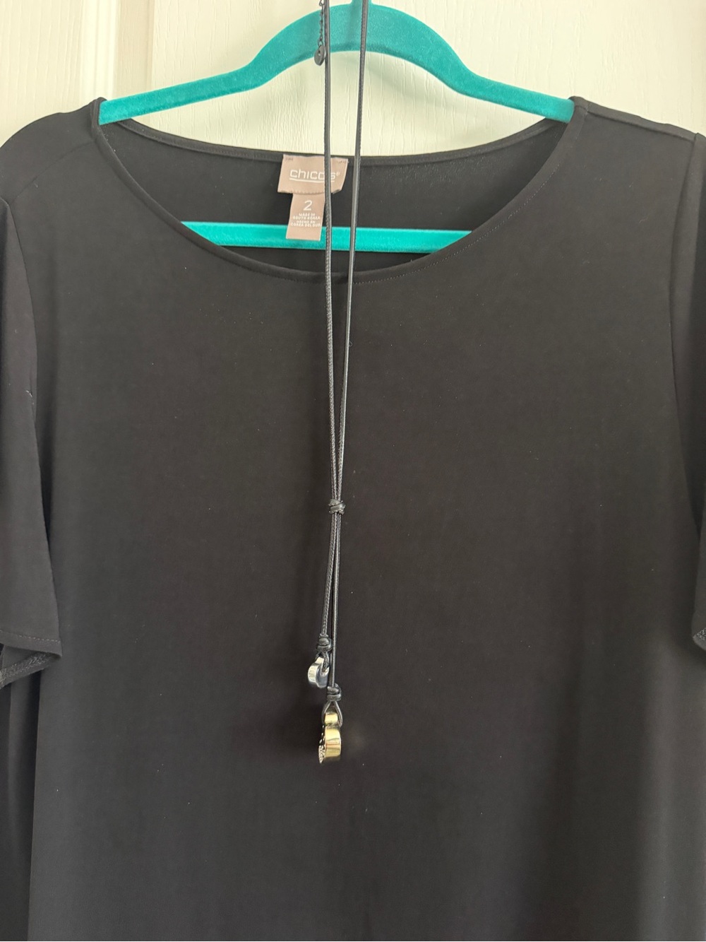 Chico's Black Necklace with two hearts.